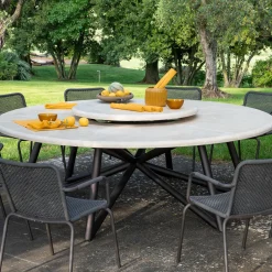 Veltha Outdoor Stone Design Outdoor Dining Tables<Hermu 230 round beige travertine stone and brown steel outdoor dining table